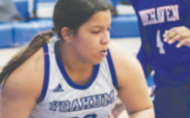 Aaliyah Wildey moves past a defender during the game against Tidehaven on Jan. 30. Photo courtesy of Raymond Rosas.