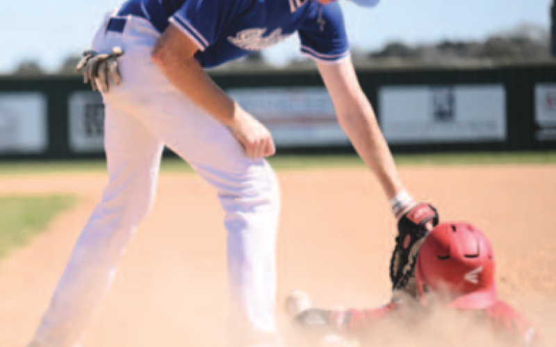 Wade Shimek vs. Burton Saturday. Chuck Grafe/Tribune-Herald