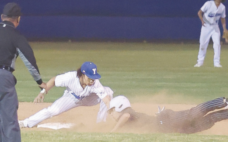 Trae Cuellar gets the Marion runner out during the game on Feb. 27. Photo courtesy of Raymond Rosas.