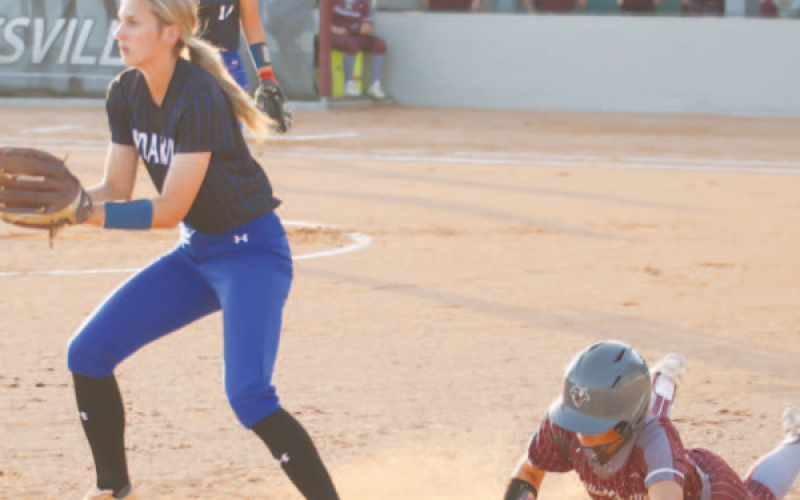 Addison Pekar covers third base in softball game at Hallettsville on March 8. Photo courtesy of Raymond Rosas.