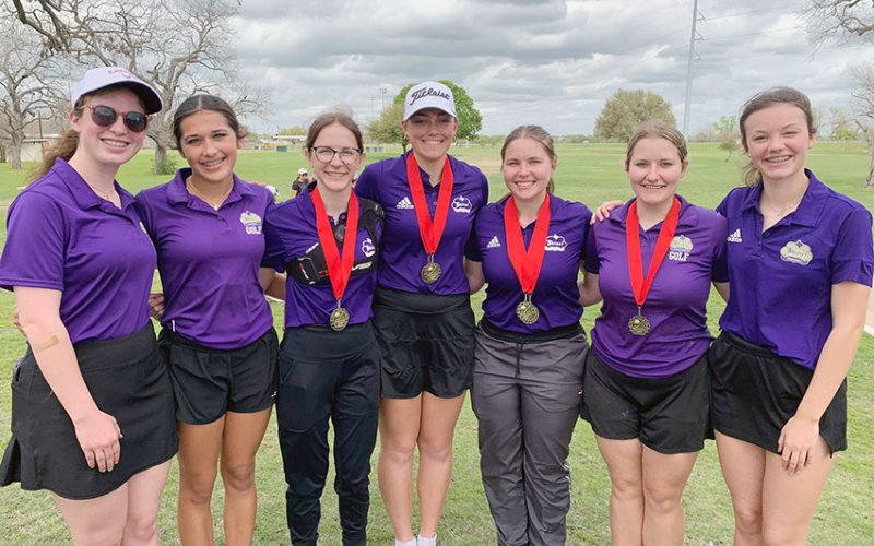 The Lady Comanches golf team won the St. Paul Tournament on March 12. From left are Maddie Collins, Jaleigh Ramirez, Grace Migl, Chelsea Whiddon, Bri Sofka, Olivia Akin and Evy Johnson. Photo courtesy of Michelle Winkenwerder