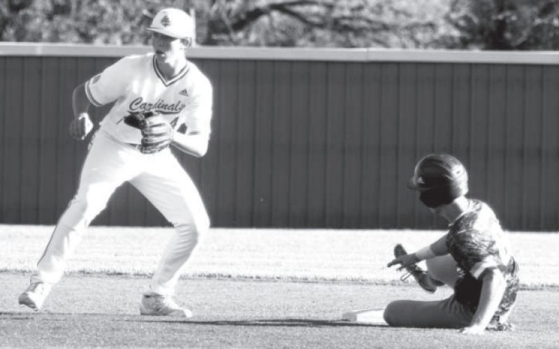 Emerson Harvey steals second in the St. Paul game. Emerson had a big night with a single, double, three stolen bases and two runs batted in. Chuck Grafe/Tribune-Herald
