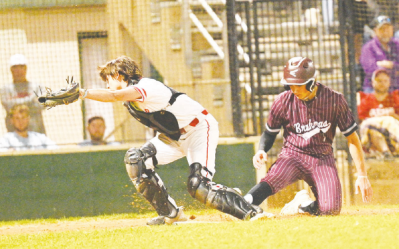 Andrew George scores on an error in the fourth inning. Chuck Grafe/Tribune-Herald