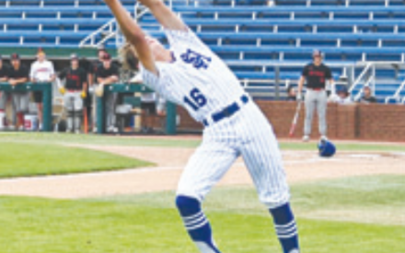 Layne Sevcik makes the catch on a foul ball vs. St. Paul. Mark Lube/Shiner Gazette