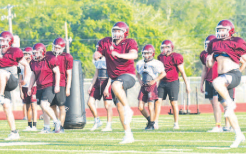 The Brahmas loosen up before Thursday’s practice Chuck Grafe/Tribune-Herald