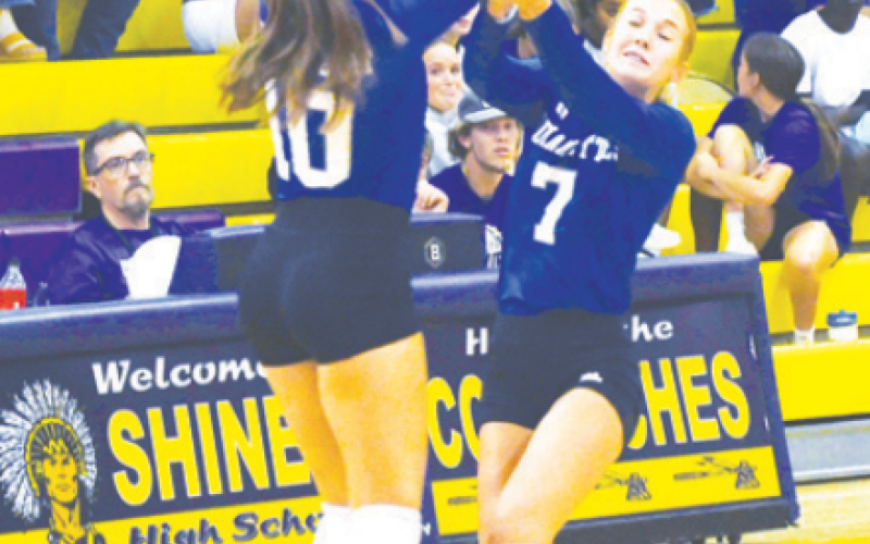 Emma Demel (10) and Rylan Dworsky (7) converge on the ball. Mark Lube/Shiner Gazette