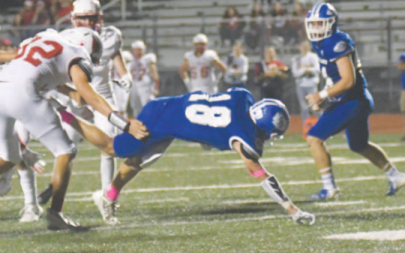Halfback Clayton Haas scores on a 2-yard run in the third quarter. Chuck Grafe/Tribune-Herald