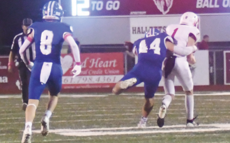 Josh Terry (44) makes the tackle on St. Paul’s Tyler Pendley. Chuck Grafe/Tribune-Herald