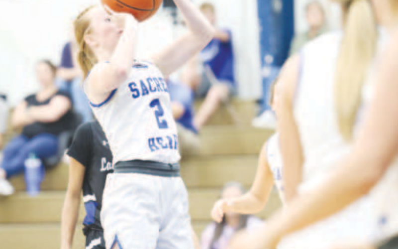 Kenzie Chance shoots a jumper inside the lane during the loss to Yoakum. Chuck Grafe/ Tribune-Herald