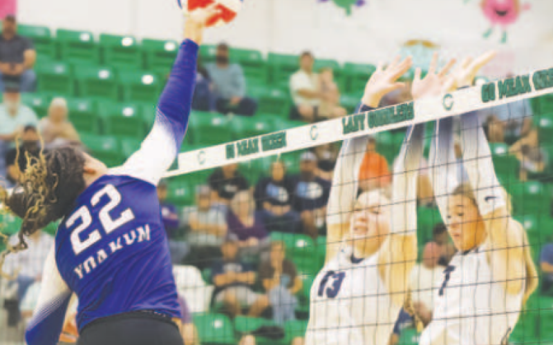 Senior Amori Harper gets a kill to tie the game 21-21. Photo courtesy of Raymond Rosas.