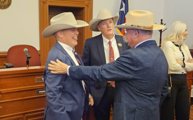 U.S. Marshal T. Michael O'Connor, the longtime former Victoria County, greets the newly badged Sheriff Greenwell and Sheriff Boyd, following the ceremony. Photo by Bobby Horecka
