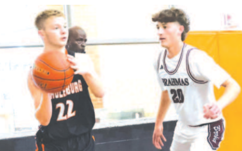 Weston Loudon guards Schulenburg’s Cade Herzik. Chuck Grafe/Tribune-Herald