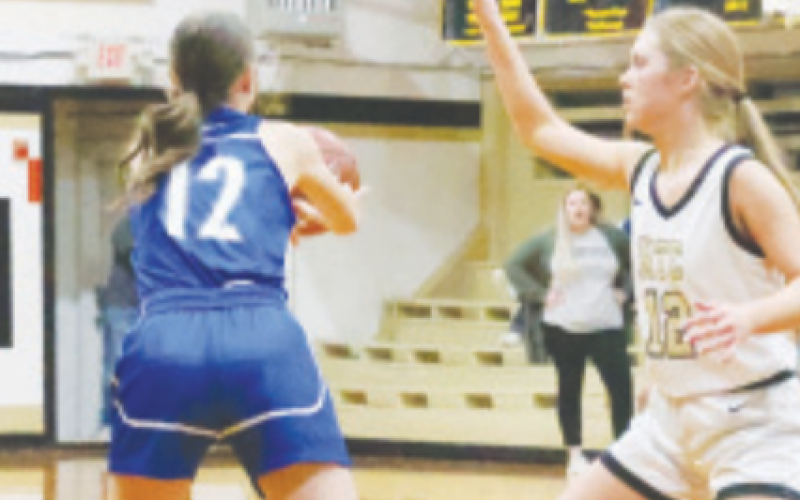 Kinley Migl makes a pass. Chuck Grafe/Tribune-Herald