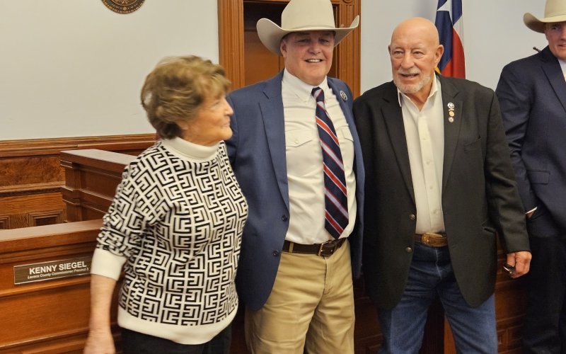 A Moulton native, Sheriff Greenwell greets his parents following the ceremony. Photo by Bobby Horecka