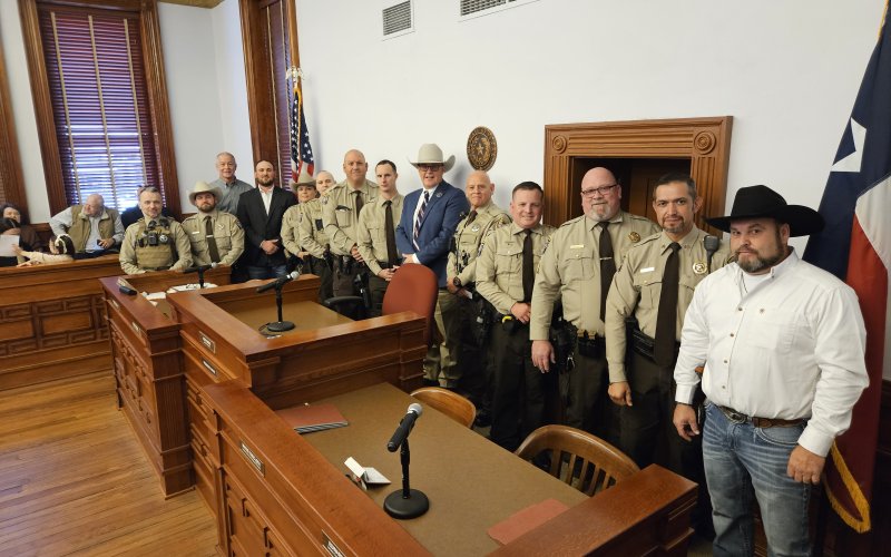 Sheriff Greenwell and deputies pose for a quick photo and their oath of office ceremony held New Year's Day in Hallettsville. Photo by Bobby Horecka