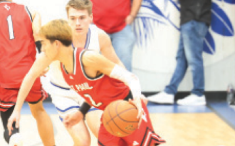 Marcus Seger guards Cardinal Ezekiah Rodriguez. Chuck Grafe/Tribune-Herald