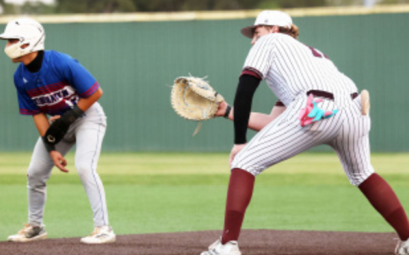 Austin Henrichs, right, had a run-scoring double in the 10-1 victory over Tidehaven Friday. Photo by Chuck Grafe