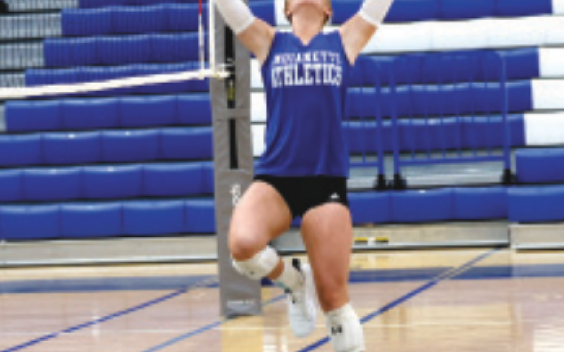 Photo by Chuck Grafe Kenzie Chance sets during the scrimmage in Yoakum Friday..