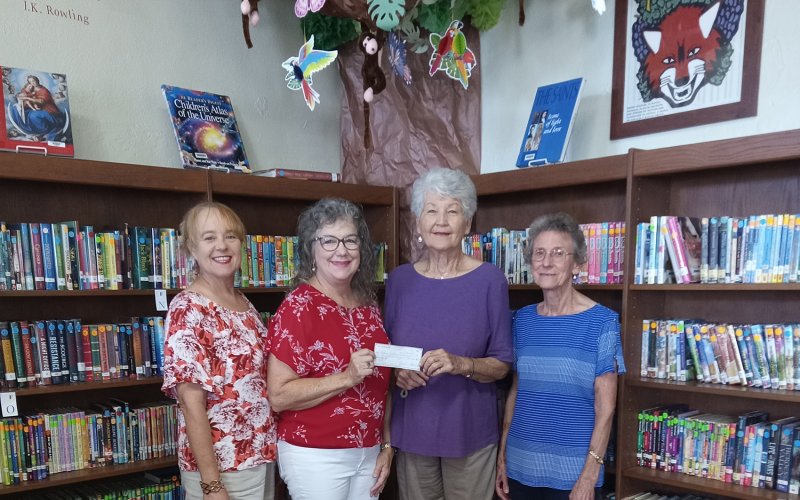 Wied KJZT Society #53 recently made a donation to the St. Ludmila Elementary library. Pictured are, left to right, Monica Peters, Stacey Haning, Helen Janak and Anita Grabarkievtz.