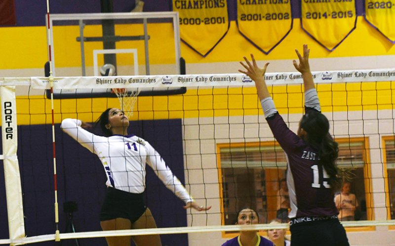 Kiera Curtis leaps up to send a ball back to East Bernard in Shiner’s 3-1 win Sept. 16 at home. Photo by Mark Lube.