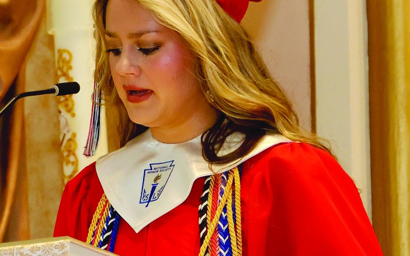 The valedictory was given by Karis Barta. 