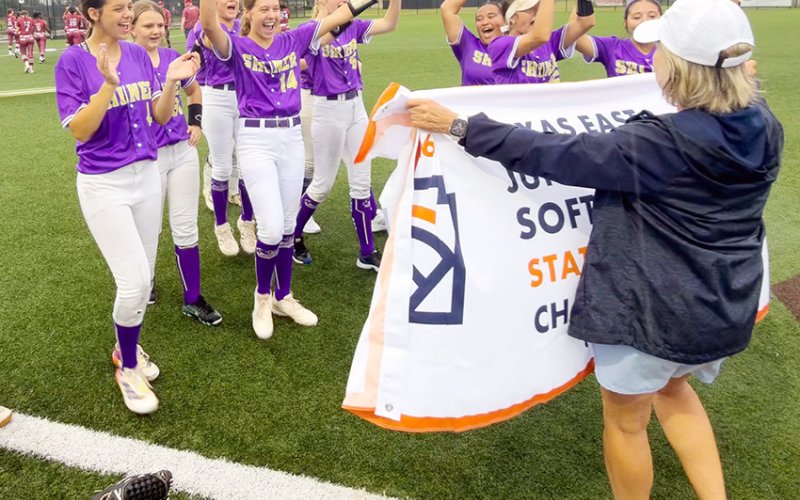 Shiner players celebrate as they are presented with the Texas East State Championship banner. Photo courtesy of  Shiner Little League.