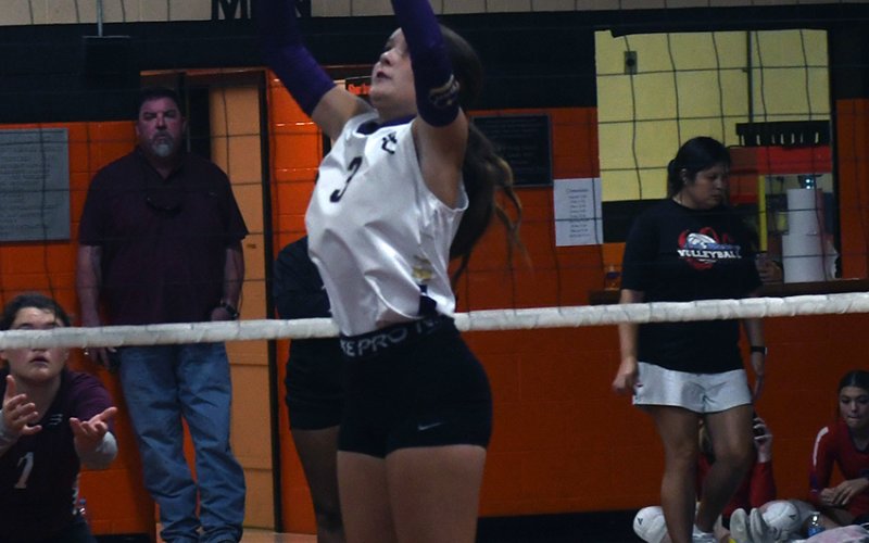 Marie Johnson makes a set during Thursday’s Schulenburg Tournament match with East Bernard. She had 10 assists. Photo by Mark Lube.