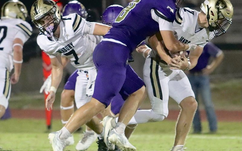 Carson Brown makes the initial contact on a Danbury ball carrier Friday night in the 16-2ADI opener for the Comanches. The Comanches offense tore up Danbury’s defense and the Shiner defense kept the Panthers out of the end zone in a 60-0 win. Photo by Louann Heinsohn.