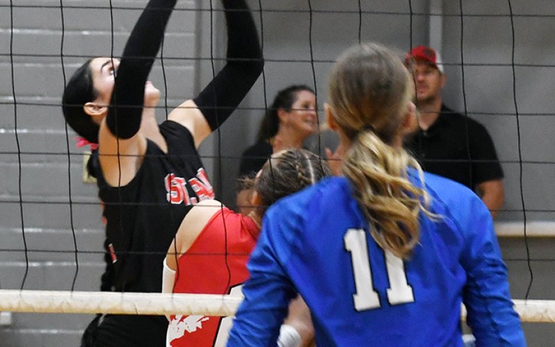 Tatum Walker (shown here against Edna Sept. 1) and the St. Paul Lady Cardinals earned a sweep at 1A No. 10 Fayetteville on Sept. 8.St. Paul had little trouble in the opener, winning 25-12. The second game was more nailbiting as the Lady Cards took a 25-21 victory.St. Paul won the third game by eight, 25-17. Photo by Mark Lube.