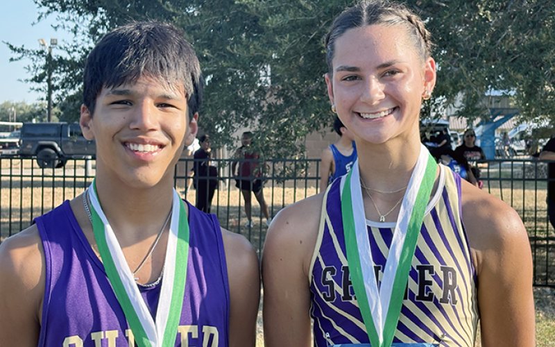 Joshua Lecon (left) placed No. 20 in the boys varsity and Addison Tudyk was No 13 in girls varsity for Shiner in the Cuero Invitational meet. Photo courtesy of Michelle Winkenwerder.