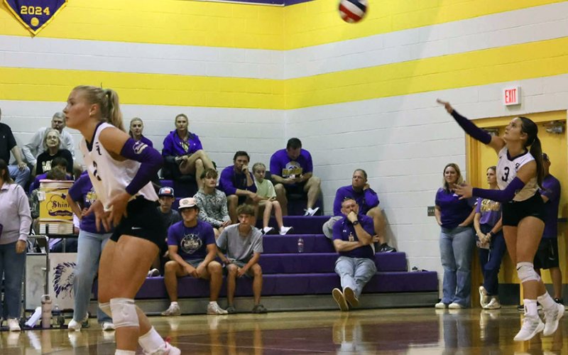 Shiner spikers Addie Prove and Marie Johnson (right) in a recent home match. Photo courtesy of Louann Heinsohn.