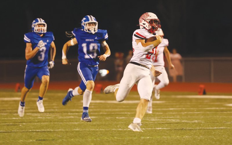 Sacred Heart is unable to catch Cardinal running back Carter Chilek on this 61-yard touchdown run, Chilek’s first of four in the game. He ran for 255 yards. Photo by Chuck Grafe/Hallettsville Tribune-Herald.