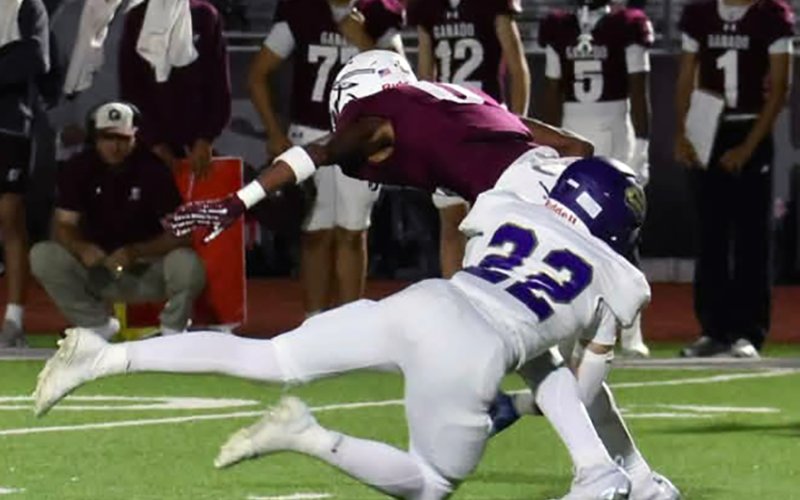 Triston Vesely wraps up Ganado receiver Zaeden Dilworth during Shiner’s 41-23 win on Friday in Ganado. Photo courtesy of Louann Heinsohn.