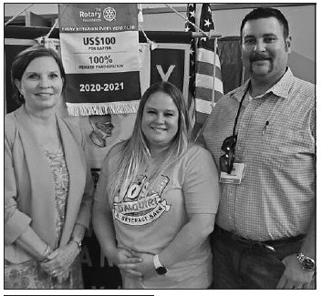 Pictured above from left to right are Rotarian Karen Barber, Tierra Jo Furrh, and Michael Furrh. The Furrhs were the guest speakers at the Rotary Club meeting April 7. Pictured at left from left to right are YHS seniors Kylie Velek and Kirsten Smith