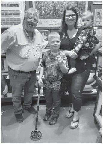 Pictured with Curator Duff Wagner, far left, is Andy Franklin, Allison Franklin and Maggie Franklin.