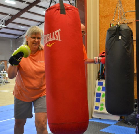 Lisa Hermes gears up for another punch during the May 4 Rock Steady Boxing Yoakum training session.