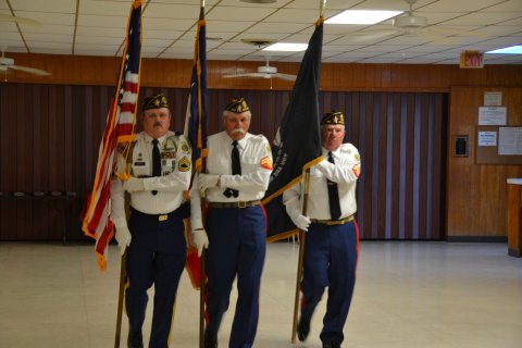 Members of American Legion Post 230 present the U.S. Flag at Memorial Day ceremonies in May 2019.