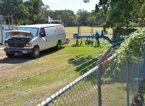 Mickelson’s Pump Shop Inc. staff tend to Well No. 4 on June 20 while City staff awaits a diagnosis of the infrastructure issue.