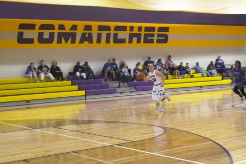 Kailey Boedeker races down court after a steal. Photo by Mark Lube.