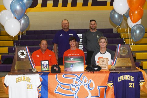 Shiner ISD's Ryan Peterson for signing with Sam Houston State University to play baseball. Seated from left is John Peterson (assistant baseball coach), Ryan Peterson and Kristi Peterson. Standing from left is head baseball coach Daniel Boedeker and assistant baseball coach Connor Stefka. Photo by Mark Lube.