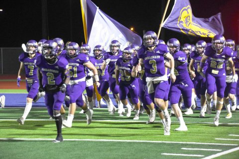 Comanches enter the field. Photo by Mark Lube.