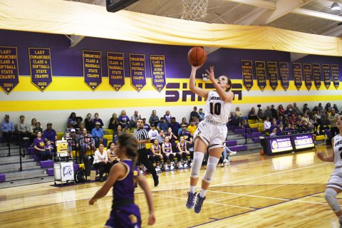 Callie Sevcik makes a jump shot from the lane. Photo by Mark Lube.