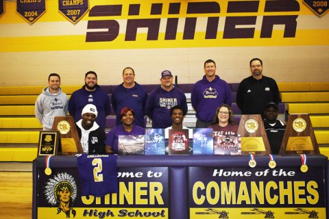 Comanche senior Dalton Brooks put the final touches on his football future by inking with Texas A&M on Dec. 21. Seated from left is Doug Brooks, Jr, Lashun Barnett, Dalton Brooks, Jacquelynn Chumchal and Doug Brooks, Sr. Standing from left is Connor Stefka, Jacob Gutierrez, John Peterson, Daniel Boedeker (AD, head football coach), Randy Palmer and Jeff Akin. Photo by Mark Lube.