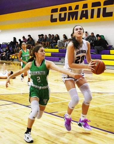 Morgan Lenehan gets close to the basket in the first quarter against Bloomington. Photo by Mark Lube.