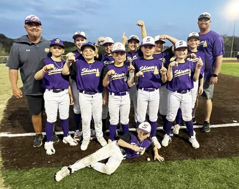 Pictured with their championship rings are front row Kannon Keller, second row Grayson Neskora, Garrett Fric, Luke Polasek, Colby Strezlczyk, Back Row Jason Keller, Owen Burke, Killian McDonald, Conley Patton, Landen Neskora, Reid Simper and Bryan Neskora. Photo courtesy of Jason Keller.