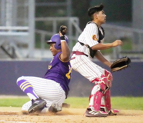 Keenan Hailey safely slides into base during Shiner’s bi-district series with Charlotte last Friday at St. Mary’s University. Hailey got three hits, scored four runs with three RBIs and a triple in the series. Photo courtesy of Howard Esse.