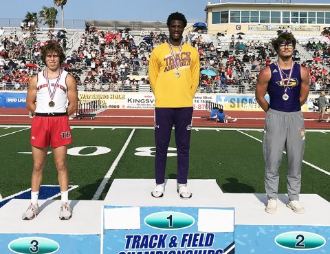 Dalton Brooks (center) won the long jump and set a Region IV-2A record with a jump of 23 feet, 8 3/4 inches. Photo courtesy of Randy Palmer.