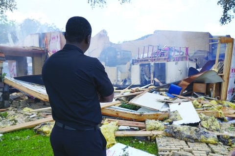 Managing Editor Janet Jones snapped this photo of the remains of the Hostyn church the day of the explosion, in which parishioner Verlene Kuntschik lost her life, helping set up for a mass. The photo placed in the Catholic Media Association’s Spot News Photo Contest for 2022. We thank her for allowing us to use it here.