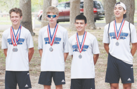 Yoakum High School Varsity Bulldogs showcase medals at the Cross Country District Meet on Oct. 9 in Yoakum. Photo courtesy of Raymond Rosas.