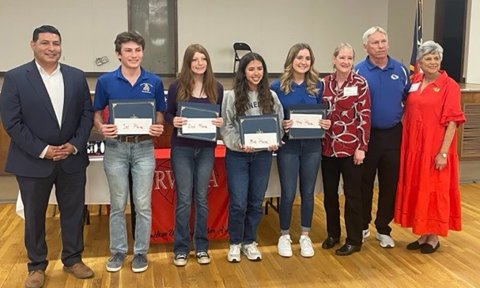 From left to right; Mark Longoria, First Place winner, Joseph Goodwyne, Second Place winner, Brealinn Finch, Third Place winner, Julia Barecky, Fourth Place winner, Ava Grace Matias, Teacher winner, Rick Masek pose with Representatives of the Republican Women of Yoakum.
